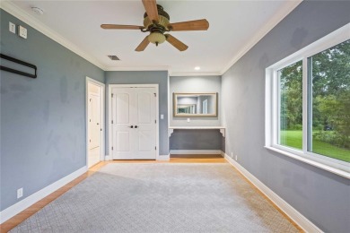 Tucked away on a spacious private lot in the guard gated on Lake Jovita Golf and Country Club in Florida - for sale on GolfHomes.com, golf home, golf lot