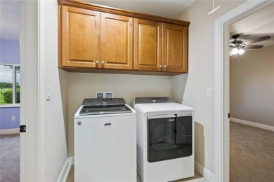 Tucked away on a spacious private lot in the guard gated on Lake Jovita Golf and Country Club in Florida - for sale on GolfHomes.com, golf home, golf lot
