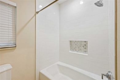 Tucked away on a spacious private lot in the guard gated on Lake Jovita Golf and Country Club in Florida - for sale on GolfHomes.com, golf home, golf lot