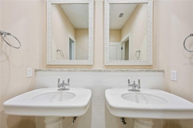 Tucked away on a spacious private lot in the guard gated on Lake Jovita Golf and Country Club in Florida - for sale on GolfHomes.com, golf home, golf lot