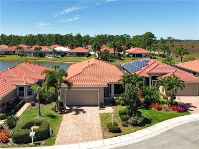Stunning Custom-Built Lilac Model Home with Saltwater Pool and on Herons Glen Golf and Country Club in Florida - for sale on GolfHomes.com, golf home, golf lot