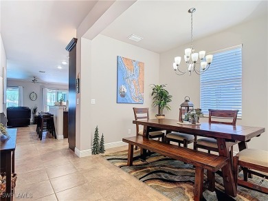 Stunning Custom-Built Lilac Model Home with Saltwater Pool and on Herons Glen Golf and Country Club in Florida - for sale on GolfHomes.com, golf home, golf lot