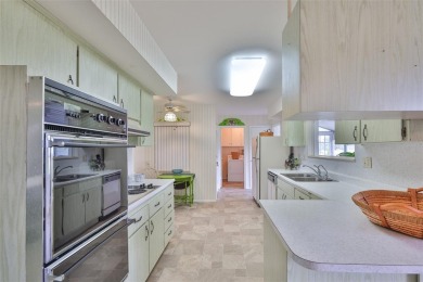 WELCOME TO YOUR CHARMING, FRESHELY PAINTED HOME- NO HOA on North Lakes Golf Course in Florida - for sale on GolfHomes.com, golf home, golf lot
