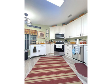 Welcome to the gorgeous community of LAKE FAIRWAYS! This vibrant on Lake Fairways Country Club in Florida - for sale on GolfHomes.com, golf home, golf lot