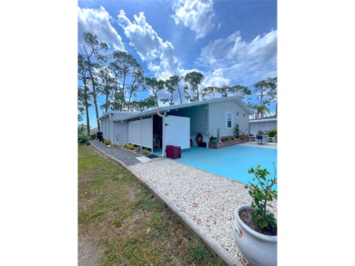 Welcome to the gorgeous community of LAKE FAIRWAYS! This vibrant on Lake Fairways Country Club in Florida - for sale on GolfHomes.com, golf home, golf lot
