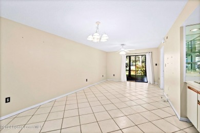 Charming 2 bedroom 2 bath condo located in quiet community of on Rockledge Country Club in Florida - for sale on GolfHomes.com, golf home, golf lot