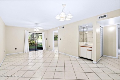 Charming 2 bedroom 2 bath condo located in quiet community of on Rockledge Country Club in Florida - for sale on GolfHomes.com, golf home, golf lot