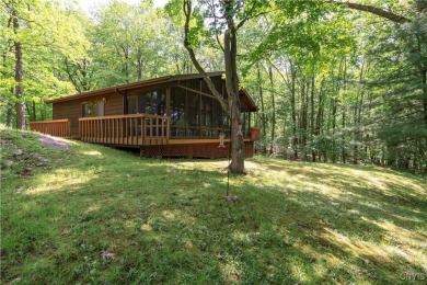 CHARMING YEAR-ROUND HOME ON 3.74 ACRES OVERLOOKING THE THOUSAND on The Thousand Island Country Club in New York - for sale on GolfHomes.com, golf home, golf lot