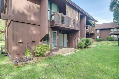 Experience comfort and style in this beautifully updated on Diamondhead Country Club in Mississippi - for sale on GolfHomes.com, golf home, golf lot