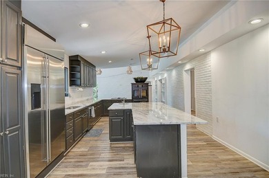 Sprawling transitional 5300 sqft home on just under an acre, set on Cavalier Golf and Yacht Club in Virginia - for sale on GolfHomes.com, golf home, golf lot