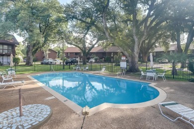 Experience comfort and style in this beautifully updated on Diamondhead Country Club in Mississippi - for sale on GolfHomes.com, golf home, golf lot