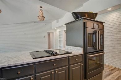 Sprawling transitional 5300 sqft home on just under an acre, set on Cavalier Golf and Yacht Club in Virginia - for sale on GolfHomes.com, golf home, golf lot