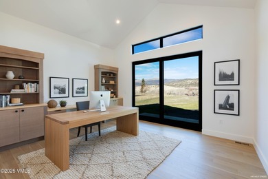 Welcome to 213 Harvester, a standout 4-bedroom with office on Eagle Ranch in Colorado - for sale on GolfHomes.com, golf home, golf lot