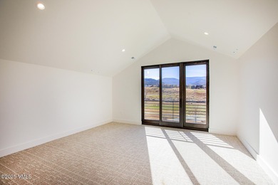 Welcome to 213 Harvester, a standout 4-bedroom with office on Eagle Ranch in Colorado - for sale on GolfHomes.com, golf home, golf lot