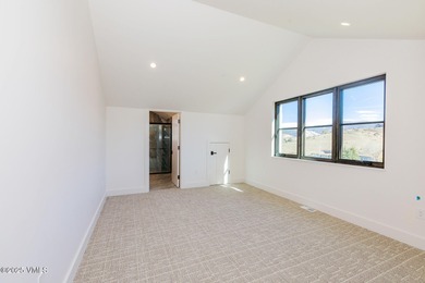 Welcome to 213 Harvester, a standout 4-bedroom with office on Eagle Ranch in Colorado - for sale on GolfHomes.com, golf home, golf lot