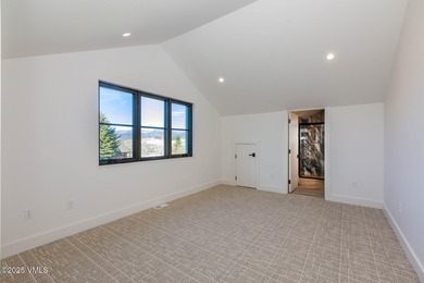 Welcome to 213 Harvester, a standout 4-bedroom with office on Eagle Ranch in Colorado - for sale on GolfHomes.com, golf home, golf lot