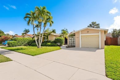 TOTALLY REMODELED 3/2 WITH 1 CAR GARAGE LOCATED RIGHT ACROSS THE on Eco Golf Club in Florida - for sale on GolfHomes.com, golf home, golf lot