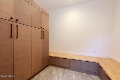 Welcome to 213 Harvester, a standout 4-bedroom with office on Eagle Ranch in Colorado - for sale on GolfHomes.com, golf home, golf lot