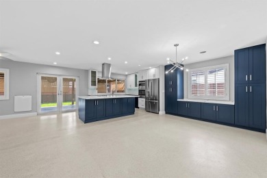 TOTALLY REMODELED 3/2 WITH 1 CAR GARAGE LOCATED RIGHT ACROSS THE on Eco Golf Club in Florida - for sale on GolfHomes.com, golf home, golf lot