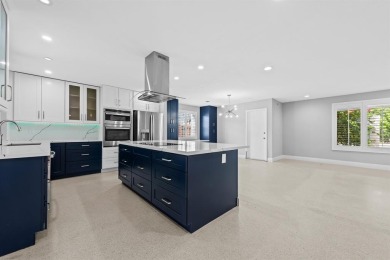 TOTALLY REMODELED 3/2 WITH 1 CAR GARAGE LOCATED RIGHT ACROSS THE on Eco Golf Club in Florida - for sale on GolfHomes.com, golf home, golf lot