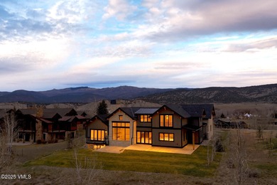 Welcome to 213 Harvester, a standout 4-bedroom with office on Eagle Ranch in Colorado - for sale on GolfHomes.com, golf home, golf lot