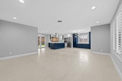 TOTALLY REMODELED 3/2 WITH 1 CAR GARAGE LOCATED RIGHT ACROSS THE on Eco Golf Club in Florida - for sale on GolfHomes.com, golf home, golf lot