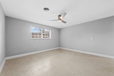 TOTALLY REMODELED 3/2 WITH 1 CAR GARAGE LOCATED RIGHT ACROSS THE on Eco Golf Club in Florida - for sale on GolfHomes.com, golf home, golf lot