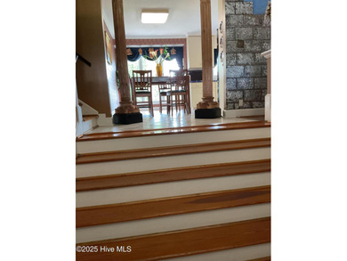 Welcome to this charming split-level home situated on the 18th on Wilson Country Club in North Carolina - for sale on GolfHomes.com, golf home, golf lot