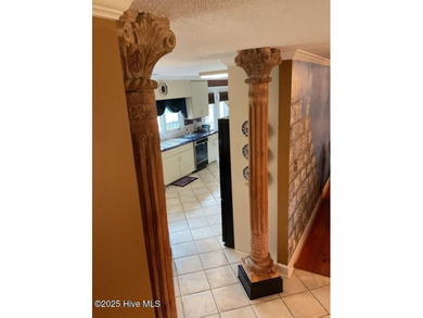 Welcome to this charming split-level home situated on the 18th on Wilson Country Club in North Carolina - for sale on GolfHomes.com, golf home, golf lot