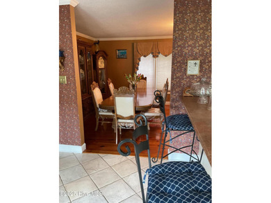 Welcome to this charming split-level home situated on the 18th on Wilson Country Club in North Carolina - for sale on GolfHomes.com, golf home, golf lot