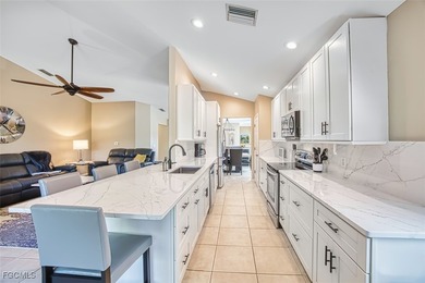 This stunning, highly desired corner Spoonbill model in Colonial on Colonial Country Club in Florida - for sale on GolfHomes.com, golf home, golf lot