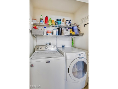 This stunning, highly desired corner Spoonbill model in Colonial on Colonial Country Club in Florida - for sale on GolfHomes.com, golf home, golf lot