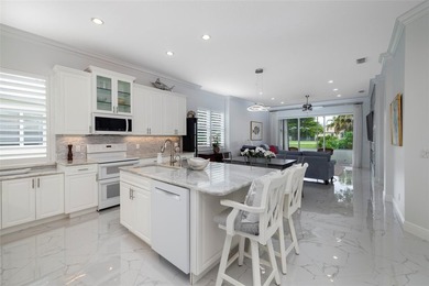 SIGNIFICANT PRICE REDUCTION on this completely updated VILLA on  in Florida - for sale on GolfHomes.com, golf home, golf lot