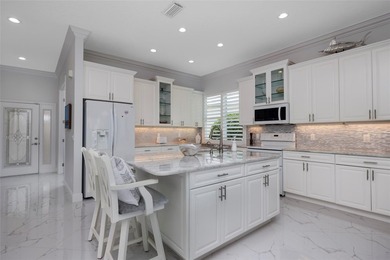 SIGNIFICANT PRICE REDUCTION on this completely updated VILLA on  in Florida - for sale on GolfHomes.com, golf home, golf lot