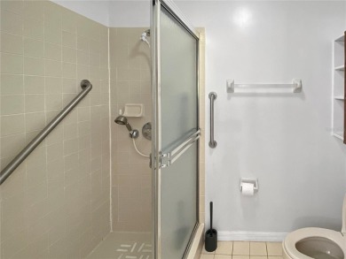 Experience the ease of low maintenance living in this bright and on Meadowbrook Golf Club in Florida - for sale on GolfHomes.com, golf home, golf lot