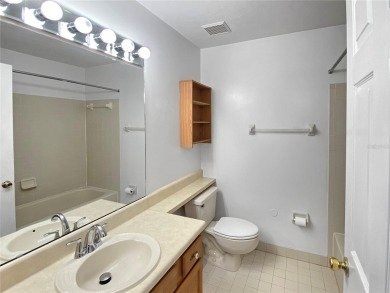 Experience the ease of low maintenance living in this bright and on Meadowbrook Golf Club in Florida - for sale on GolfHomes.com, golf home, golf lot