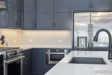 Luxury lock-and-leave living in the gated TPC golf course on TPC Colorado Golf Club in Colorado - for sale on GolfHomes.com, golf home, golf lot