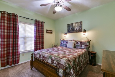 Experience the ultimate blend of comfort and prestige in this on Ledgestone Country Club and Golf Course in Missouri - for sale on GolfHomes.com, golf home, golf lot