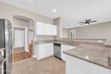Beautiful single level home located on a private golf course lot on Seville Golf and Country Club in Arizona - for sale on GolfHomes.com, golf home, golf lot
