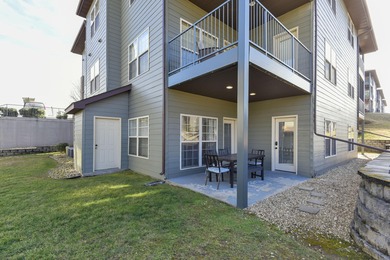 Experience the ultimate blend of comfort and prestige in this on Ledgestone Country Club and Golf Course in Missouri - for sale on GolfHomes.com, golf home, golf lot