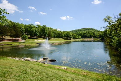 Experience the ultimate blend of comfort and prestige in this on Ledgestone Country Club and Golf Course in Missouri - for sale on GolfHomes.com, golf home, golf lot