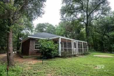 Charming Point Clear property ideally located between Lakewood on Lakewood Golf Club in Alabama - for sale on GolfHomes.com, golf home, golf lot