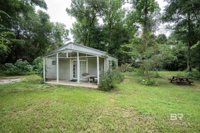 Charming Point Clear property ideally located between Lakewood on Lakewood Golf Club in Alabama - for sale on GolfHomes.com, golf home, golf lot