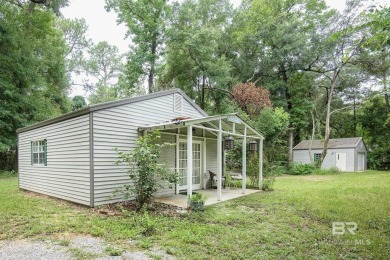 Charming Point Clear property ideally located between Lakewood on Lakewood Golf Club in Alabama - for sale on GolfHomes.com, golf home, golf lot