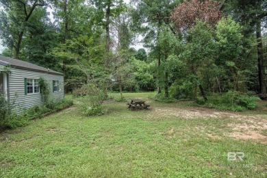 Charming Point Clear property ideally located between Lakewood on Lakewood Golf Club in Alabama - for sale on GolfHomes.com, golf home, golf lot