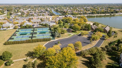 Spectacular 3-bedrooms, 2.2-bath home overlooking the pond and on White Eagle Golf Club in Illinois - for sale on GolfHomes.com, golf home, golf lot