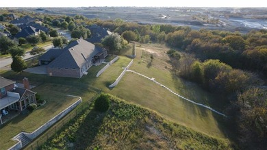 Tucked away in a quiet Benbrook neighborhood just minutes from on Whitestone Golf Club in Texas - for sale on GolfHomes.com, golf home, golf lot