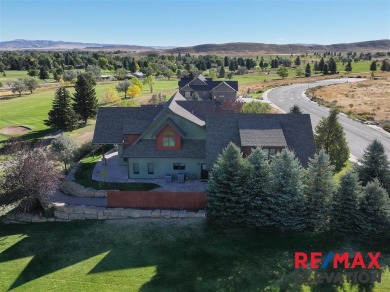 This custom-built timber-frame style home offers 4,514 sq. ft on Olive Glenn Golf and Country Club in Wyoming - for sale on GolfHomes.com, golf home, golf lot