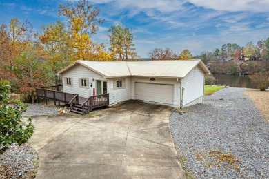 Welcome to 4 Oporto Place a charming lakefront retreat in the on Balboa Golf Course in Arkansas - for sale on GolfHomes.com, golf home, golf lot