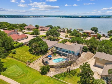 No cookie-cutter house here! Located on the 18th tee box in on De Cordova Bend Country Club in Texas - for sale on GolfHomes.com, golf home, golf lot